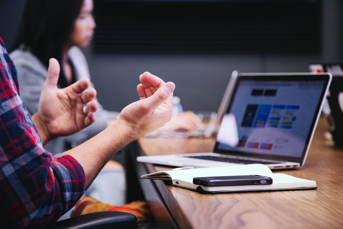 Professional reviewing LinkedIn personal brand content strategy at desk — Ajlal Haider LinkedIn tips