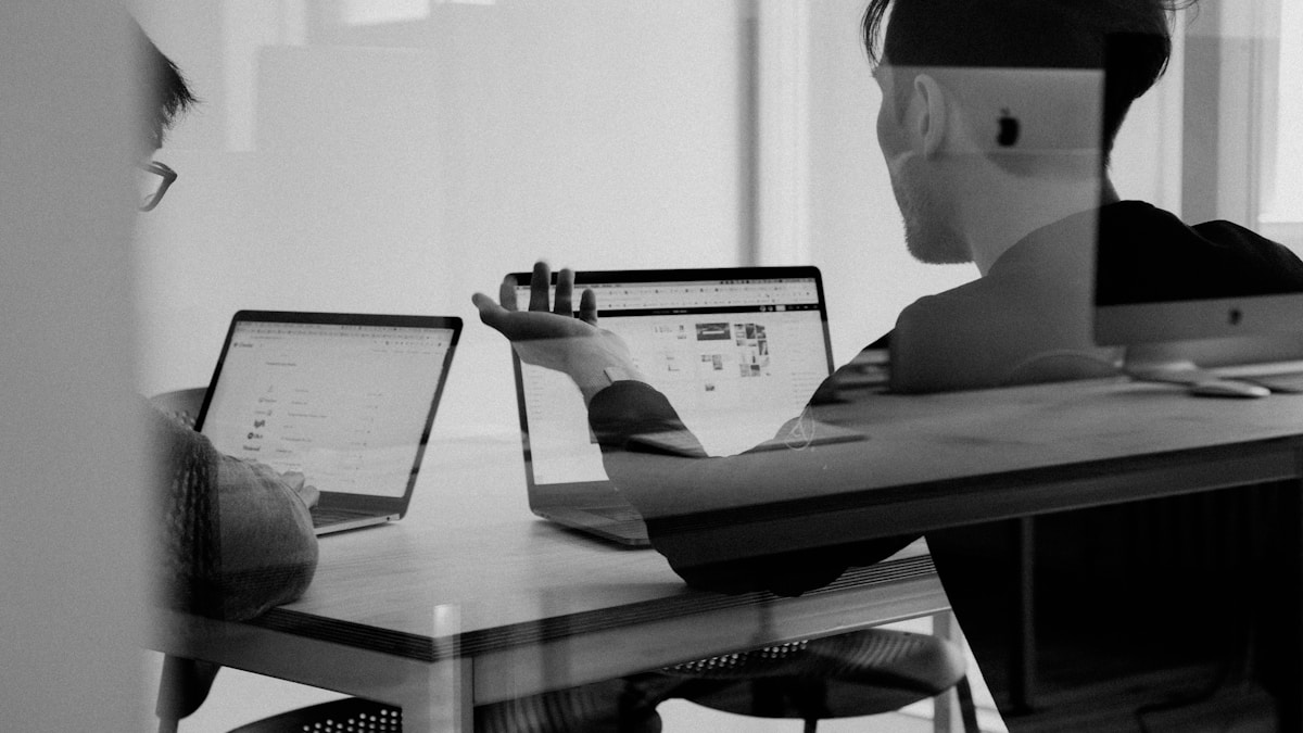 LinkedIn content strategy workspace with laptop and notebook showing video content planning