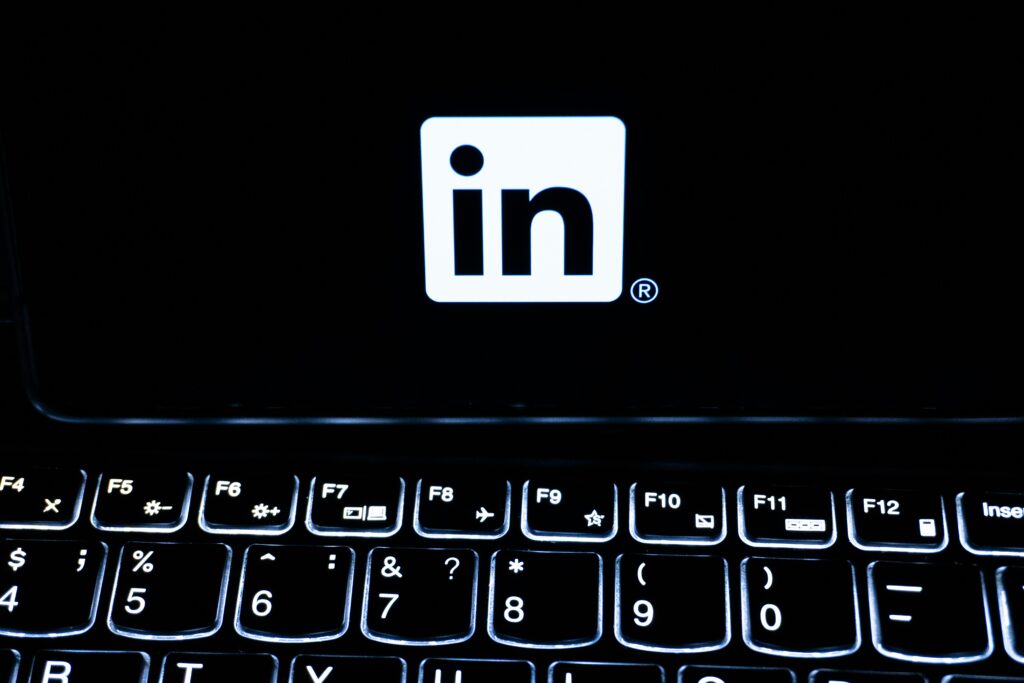 LinkedIn displayed on a laptop for an article about attracting U.S. and Canadian clients